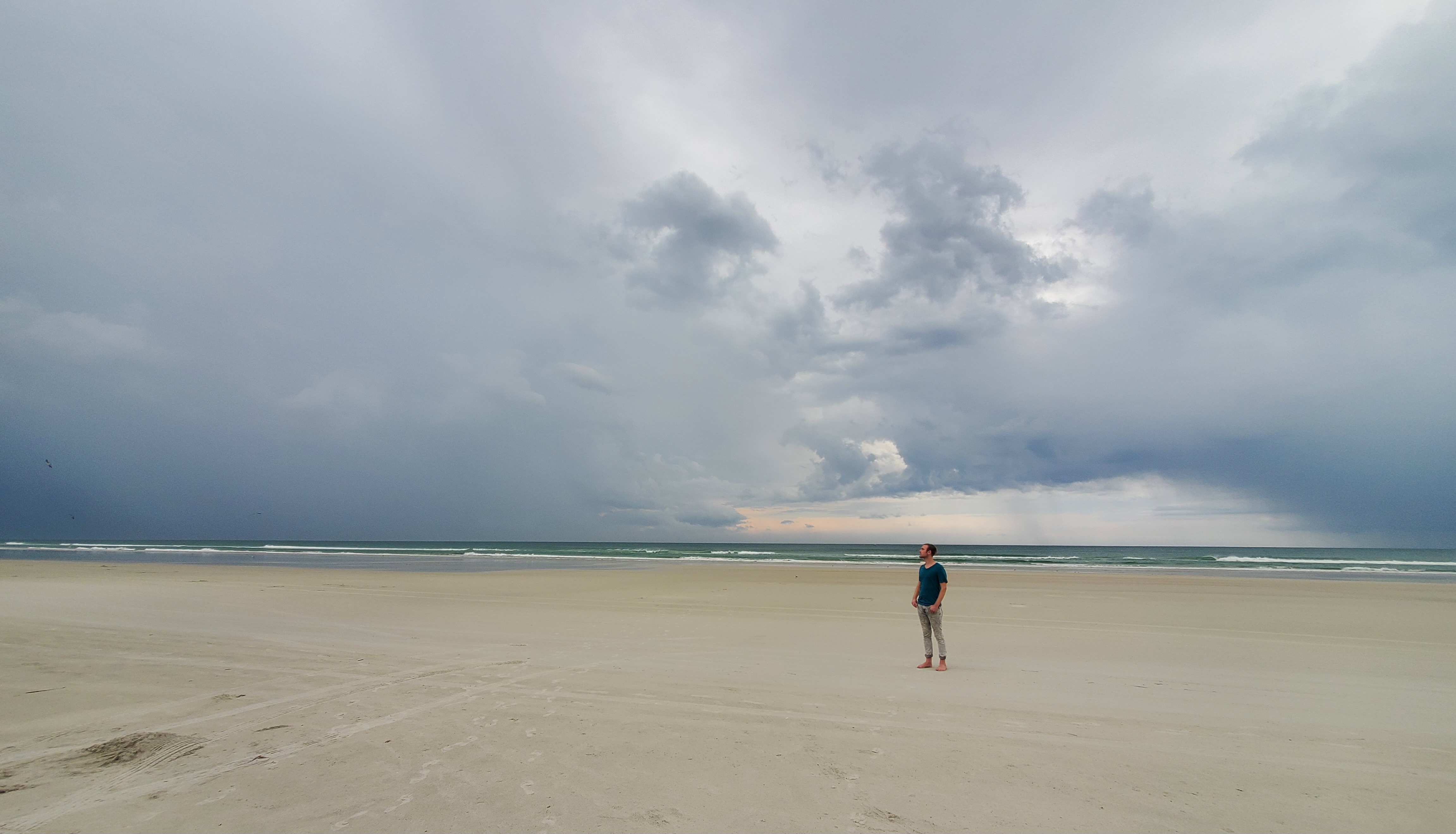 person standing on a beach