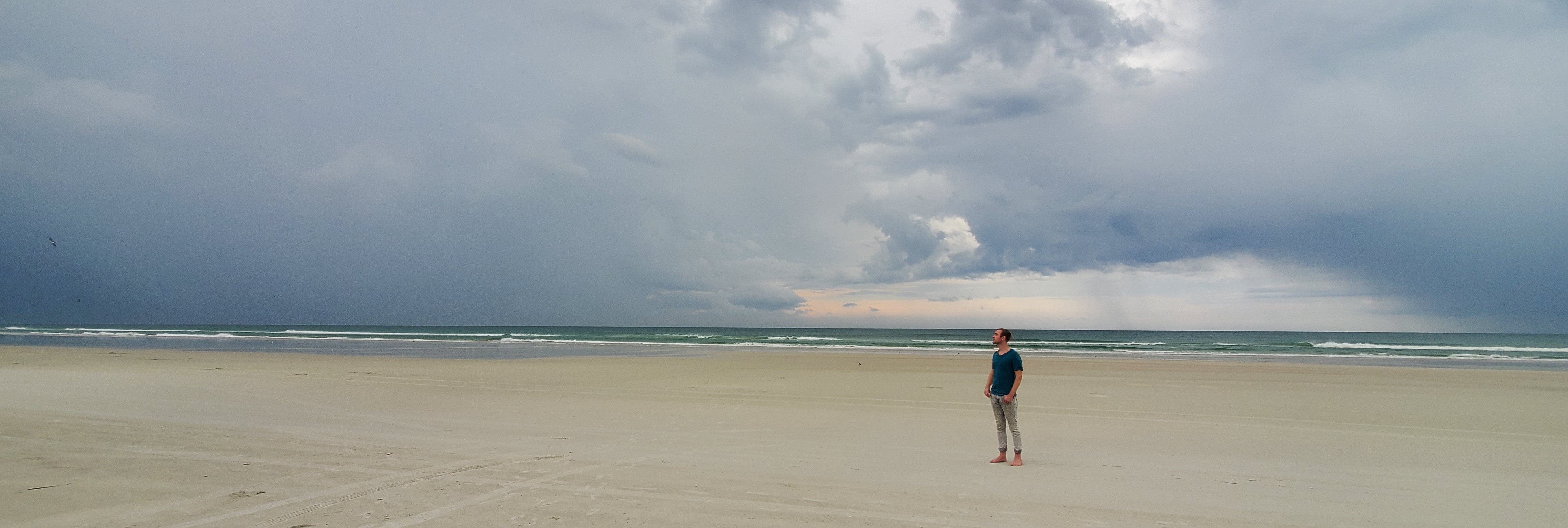 person standing on a beach